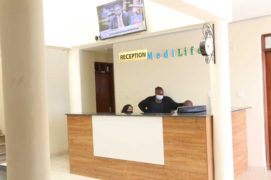 Medilife Hospital reception area with branded signage