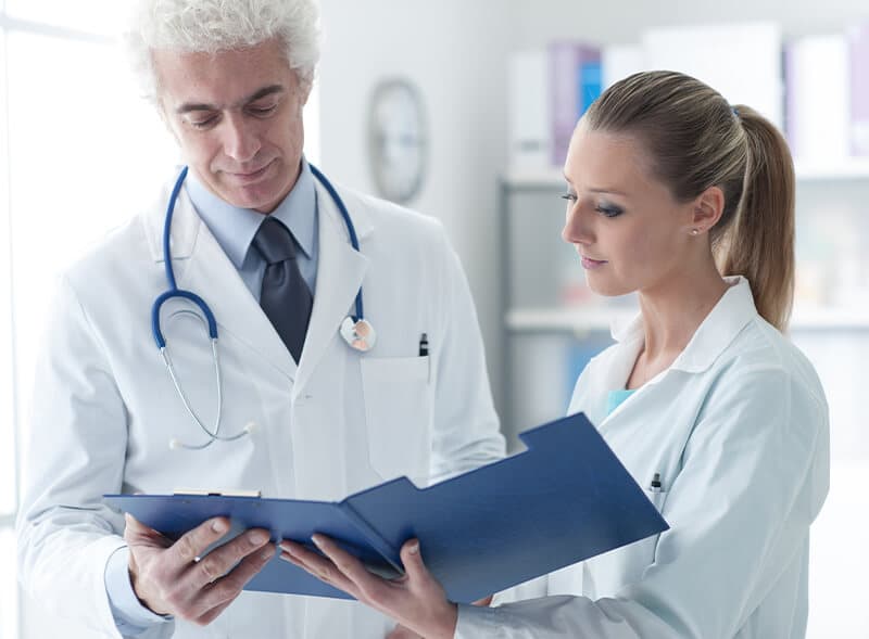 Doctor reviewing patient medical records